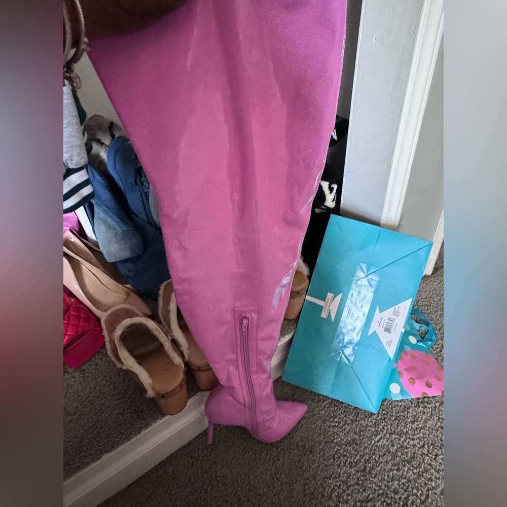 Pink thigh, high leather boobs never been worn.